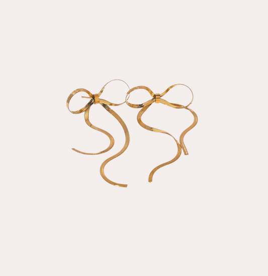 fine bow studs gold